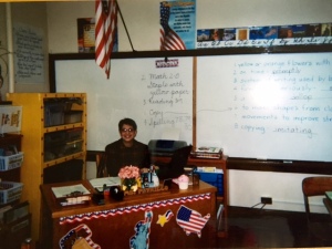 teacher at desk